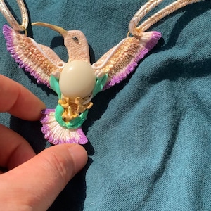 Creamy white purple hummingbird necklace