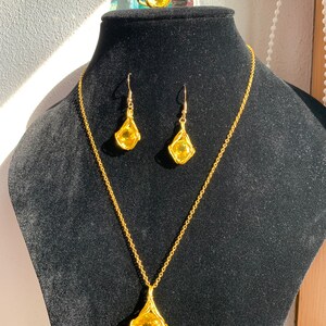 Brighter than the Sun Sapphires Set | Pendant, earrings and ring