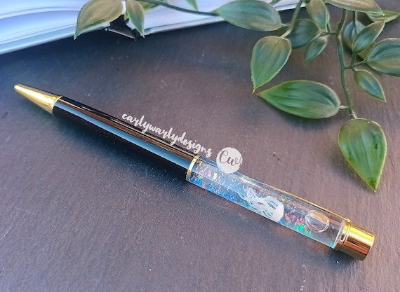 Stylo bille avec liquide à paillettes glitter