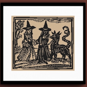 May include: Black and tan framed print of a vintage illustration depicting two figures in witch hats leading a creature with a long tail. The artwork is in a woodcut style.