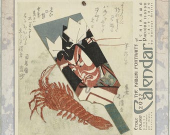 May include: A 2027 wall calendar titled The Kabuki Portraits of Ishikawa featuring a traditional Japanese woodblock print illustration of a red lobster and a stylized Kabuki actor face on a paddle-shaped background with Japanese calligraphy.