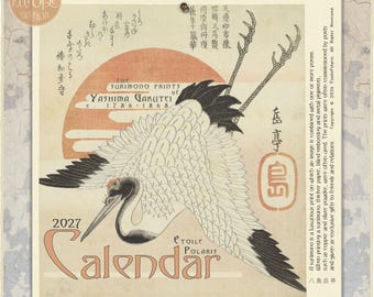 May include: A 2027 wall calendar featuring a vintage-style illustration of a white crane with black wingtips and a red crown. The design includes a large orange sun, Japanese calligraphy, and the text The Surimono Prints of Yashima Gakutei.