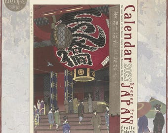 May include: A 2027 wall calendar titled Scenes from Japan featuring a print of a large red lantern at the Kannon temple in Asakusa. The calendar includes artwork by Tsuchiya Koitsu, Kasamatsu Shiro, Yoshida Hiroshi, Narazaki Eisho, Ohara Koson, and Kawase Hasui.