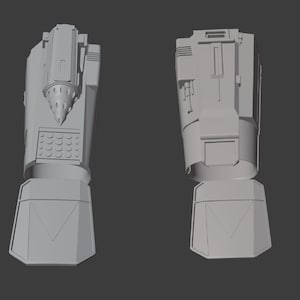 May include: A 3D model of a futuristic drill arm, shown from two different angles. The arm has a drill bit at the end and a series of buttons and controls on the side.