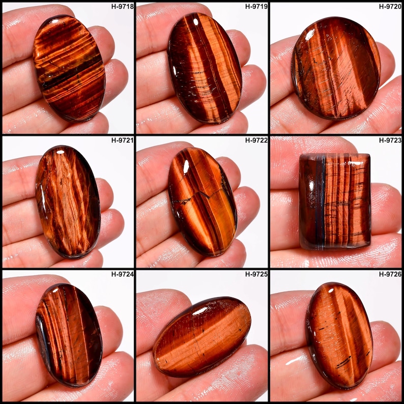 May include: A selection of polished tiger's eye gemstones in different shapes, including oval and rectangular. The stones exhibit rich brown and gold bands, with a glossy finish. Each stone is unique, showcasing natural patterns.