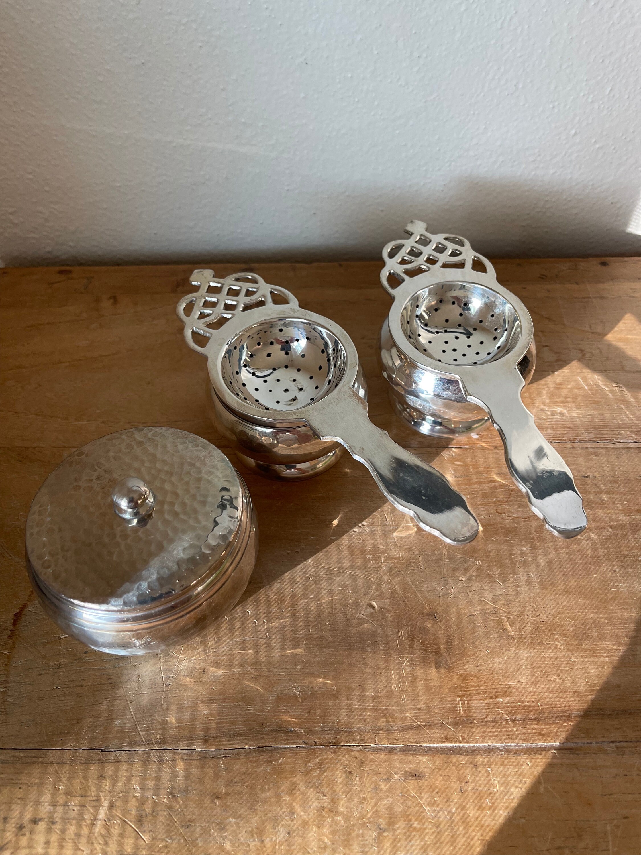 A Collection of Vintage Silver Tea Strainers .