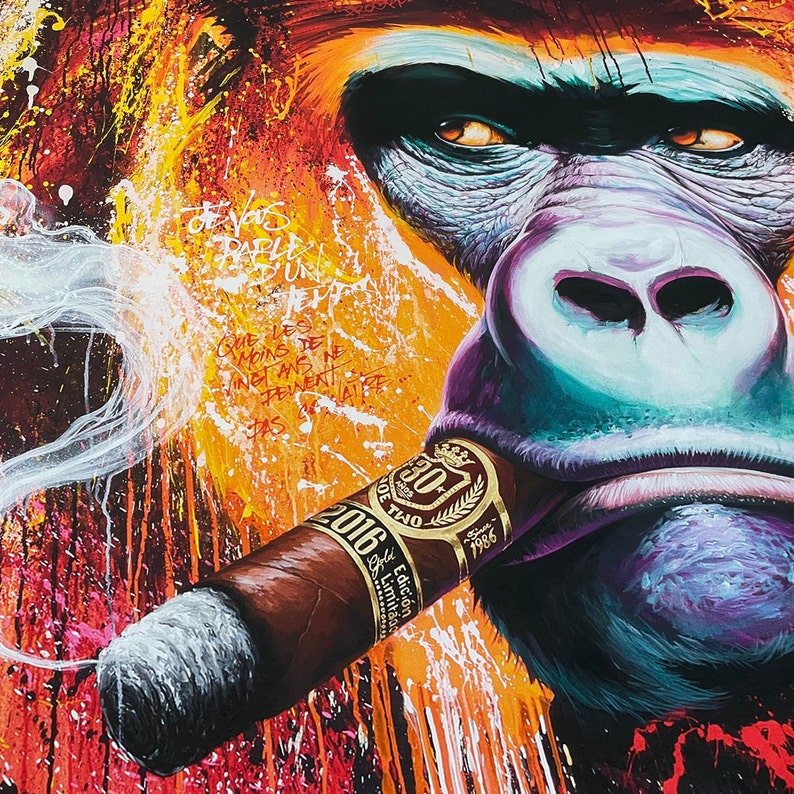 May include: A vibrant painting of a gorilla smoking a cigar. The artwork features a close-up of the gorilla's face with a brown cigar in its mouth. The background is a mix of orange, yellow, and red paint splatters, with French text.