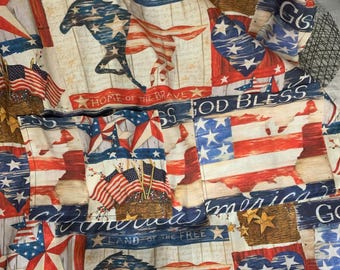 May include: Patriotic fabric with American flags, stars, and the text "America, Land of the Free" and "Home of the Brave." The design includes a horse silhouette and a heart shape with stars.