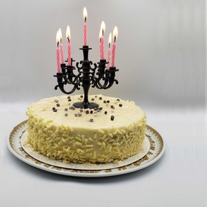 Candelabra cake topper with candles, available in 10 colors