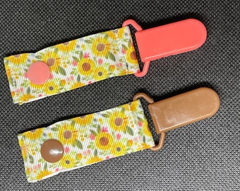 Small Sunflowers with Little Pink Flower Tubie Clips for Securing IV Lines and Feeding Tubes