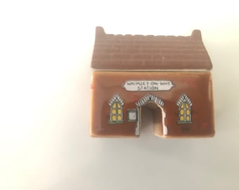 Figuras de Wade Whimsey sobre el porqué - Estación de servicio Whimsy