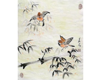 May include: A traditional ink wash painting on paper featuring two small birds with orange and grey plumage in flight near a bamboo branch. The artwork includes black ink brush strokes, delicate orange accents, red seal stamps, and Japanese calligraphy.