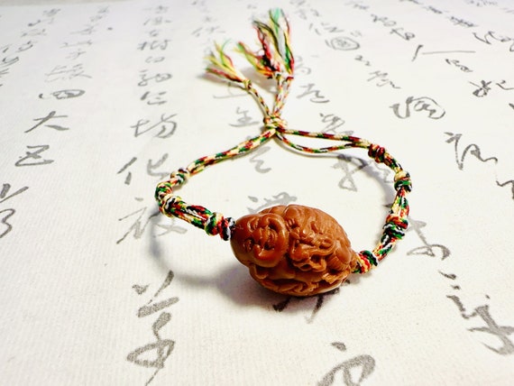 Hand Carved Olive Pit 3D Happy Buddha Amulet and Good Luck Bracelet / Braided Rope Turquoise Bracelet/ Yoga Meditation Jewellery