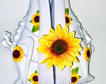 white sunflower nike sandals