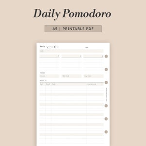 May include: Printable A5 daily Pomodoro planner with sections for goals, time for sessions, session log, and break activities. The planner has a minimalist design with a light gray background.