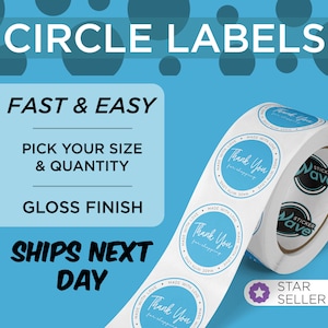 May include: A roll of white sticker labels with a blue and white design. The labels say "Thank You for shopping" and "Made with Love". The roll is labeled "Sticker Wave" and "Star Seller".