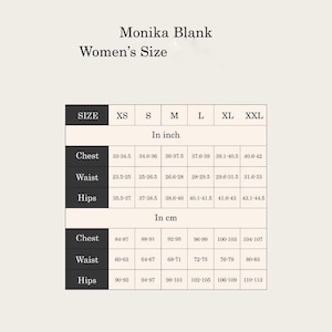 May include: Size chart for women's clothing with measurements in inches and centimeters. The chart shows sizes XS through XXL with corresponding chest, waist, and hip measurements.