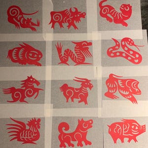 Carta ritagliata dello zodiaco cinese (autentica)
