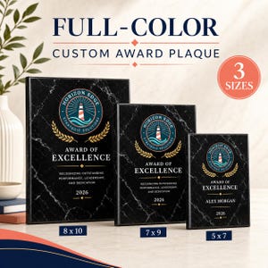 May include: Three rectangular black marble-patterned award plaques in sizes 8x10, 7x9, and 5x7 inches. Each plaque features a circular logo with a lighthouse, the text Horizon Edge Strategic Solutions, Award of Excellence, 2026, and Alex Morgan.
