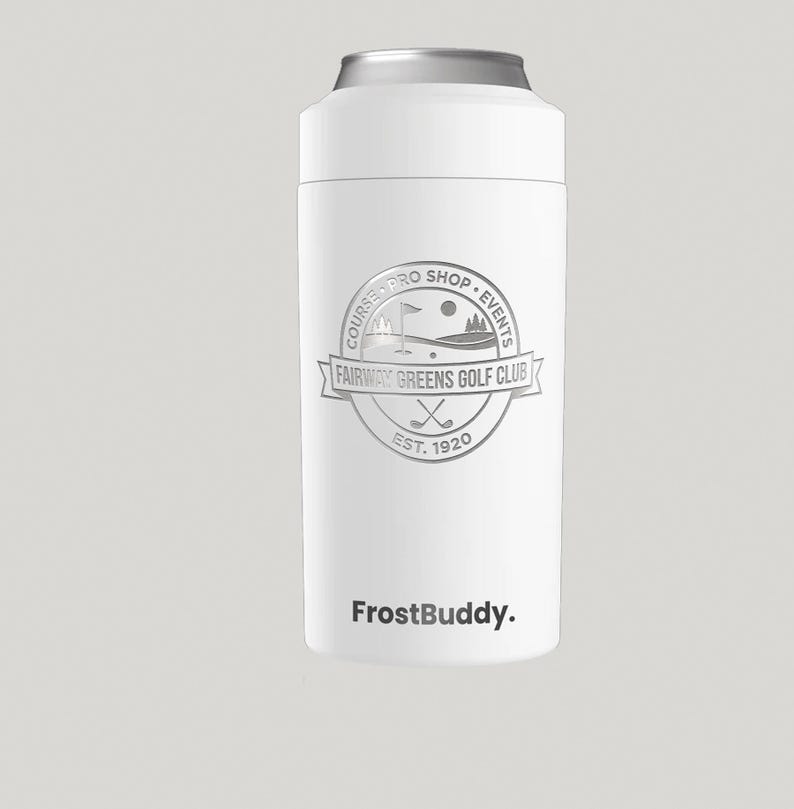 May include: White insulated can cooler with a silver rim. The cooler features a circular logo for Fairway Greens Golf Club, with the text "Course Pro Shop Events" and "Est. 1920". The brand name "FrostBuddy" is printed at the bottom.