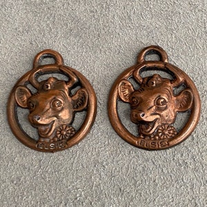 2 Elsie The Cow Plastic Charms
