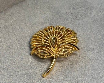 Signed Trifari Gold Tone Flower Brooch