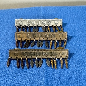 Three sets of Awana Chums Pins Feather Arrow Torch