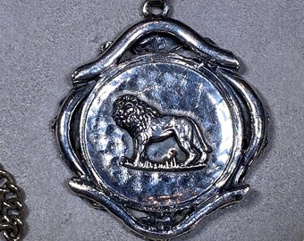 Vintage Silvertone Lion/Elephant Pendant