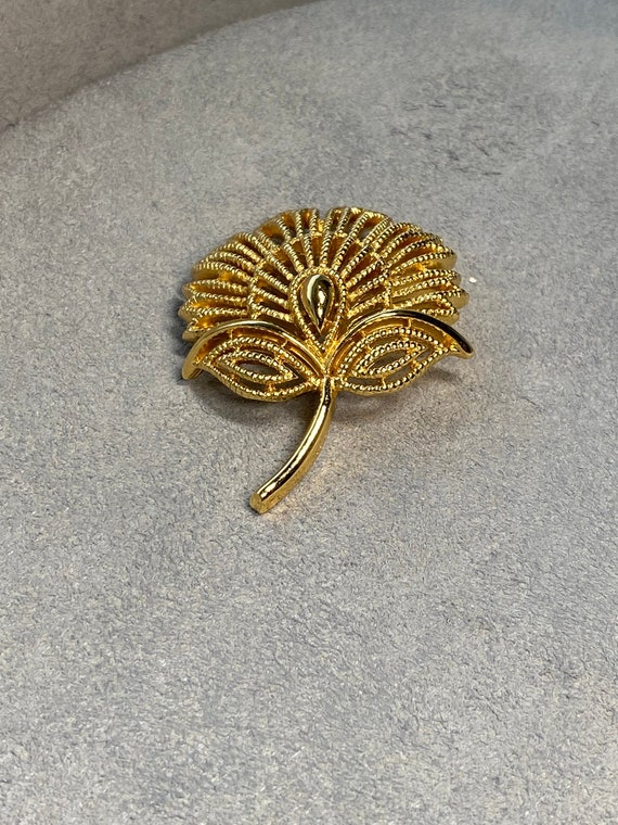 Signed Trifari Gold Tone Flower Brooch - image 1