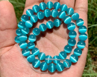 Cuentas redondas de ojo de gato, cuentas de piedras preciosas, cuentas de chakras, cuentas de monalisa, cuentas auténticas de ojo de gato azul de 8 mm (14 pulgadas)