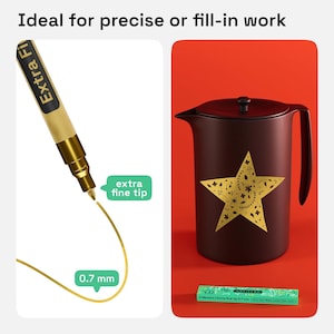 May include: Gold metallic marker pen with an extra fine 0.7 mm tip. The marker is ideal for precise or fill-in work. The image shows a gold star with floral details drawn on a brown ceramic teapot.