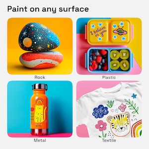 May include: A collage of four images showing different surfaces that can be painted on. The surfaces include a rock, a plastic lunchbox, a metal water bottle, and a textile t-shirt. Each surface has a colorful design painted on it.