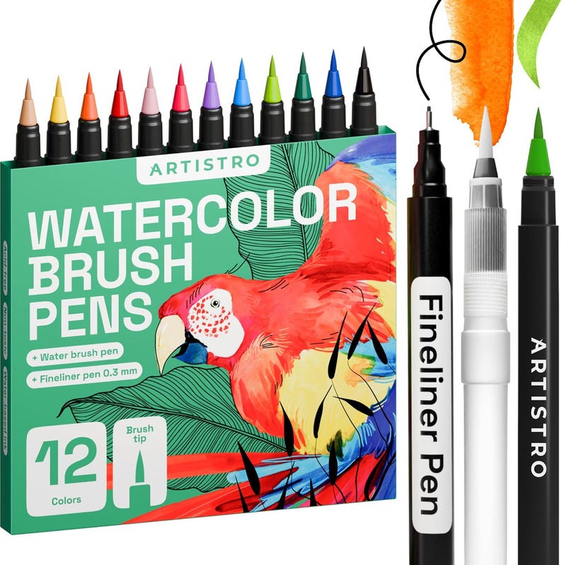 May include: A set of 12 Artistro watercolor brush pens in a green box featuring a parrot illustration. The set includes a black fineliner pen with a 0.3 mm tip, a white water brush pen, and a black brush pen with a green tip, alongside 12 colored pens.