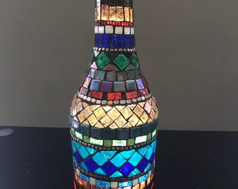 Jewel toned wine bottle stained glass mosaic. Fairy lights included.