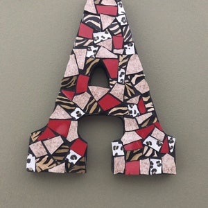 Letter A mosaic wall hanging in animals print and red