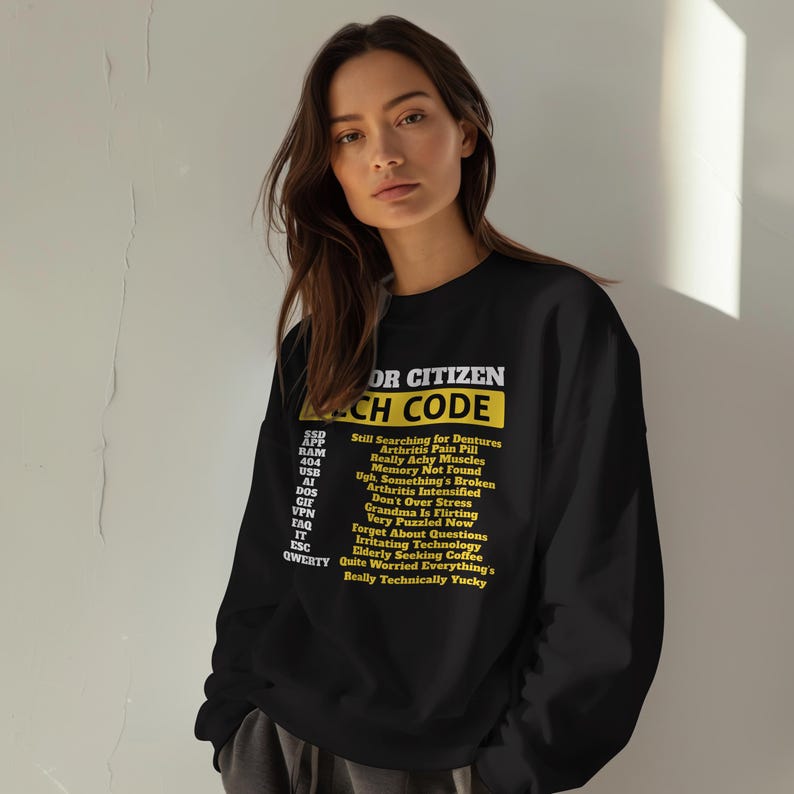 May include: Black sweatshirt with the text "OR CITIZEN TECH CODE" in white and yellow. Below the title are a series of acronyms and phrases, including "Still Searching for Dentures" and "Really Technically Yucky".