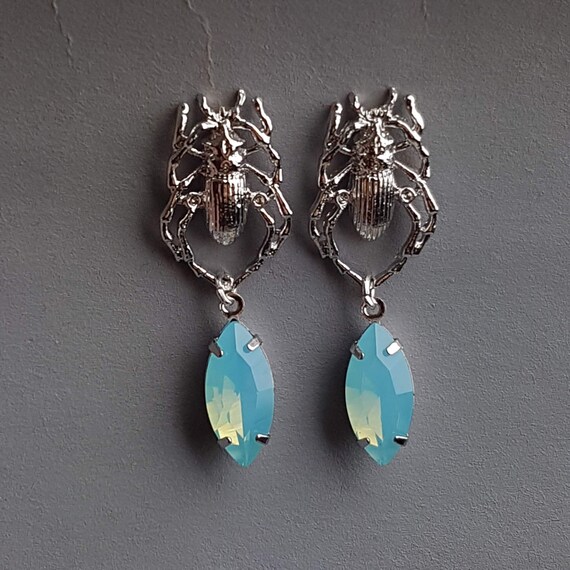 Swarovski hotsell beetle earrings