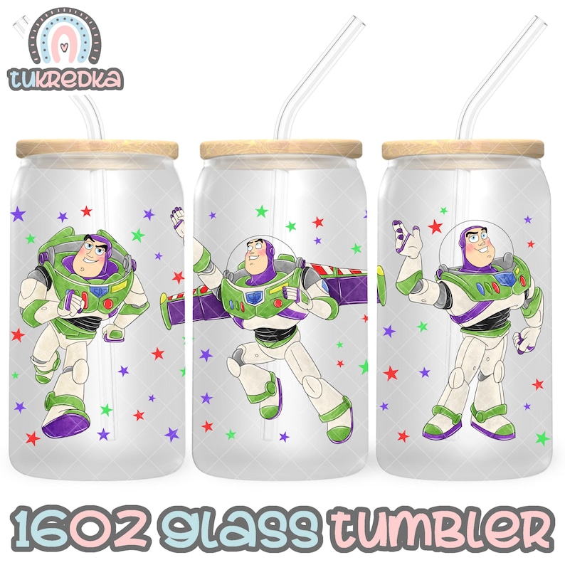 May include: Three clear glass tumblers with a bamboo lid and a straw. Each tumbler features a cartoon image of Buzz Lightyear from the Toy Story film. The background is white with colourful stars.