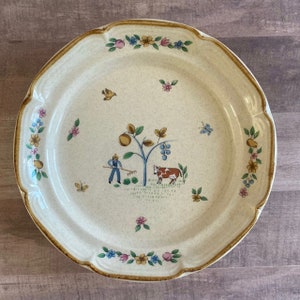 Heartland by International Salad Plate; Stoneware, Farm Scene, Farmer, Scalloped Tan Trim