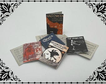 Puede incluir: Una colección de partituras de música de Halloween vintage con títulos como "Halloween Song", "That Spooky Rag" y "At the Devil's Ball".