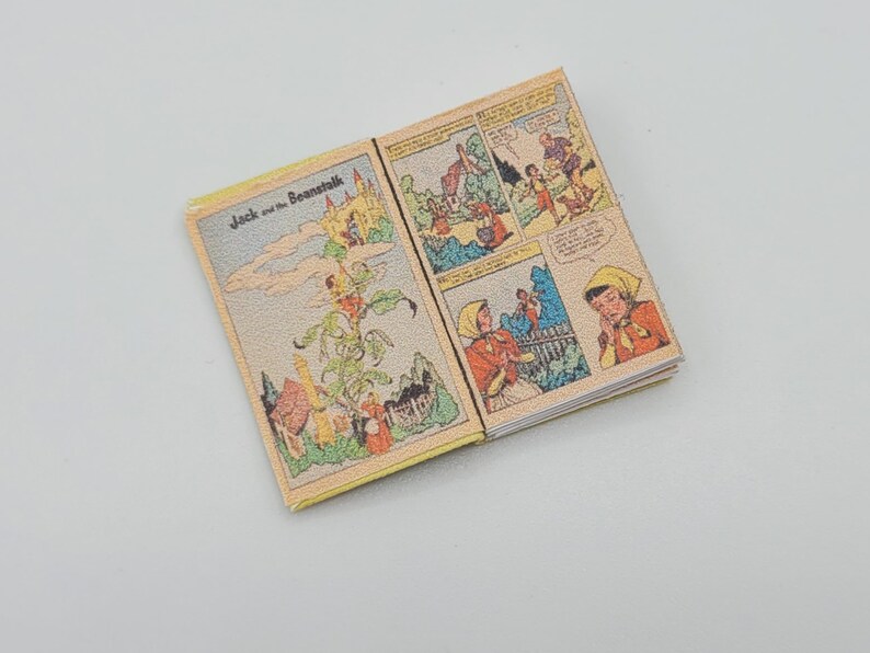 May include: An open vintage comic book titled "Jack and the Beanstalk". The comic book features colorful illustrations of Jack climbing the beanstalk and a giant in a castle.