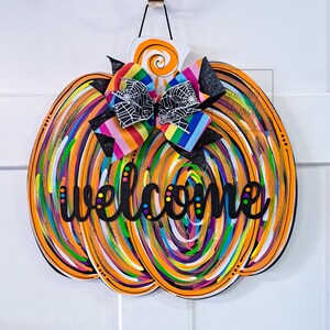 whimsical pumpkin door hanger, halloween pumpkin decor, colorful pumpkin door sign, pumpkin door decor, fall door sign, rainbow pumpkin image 1