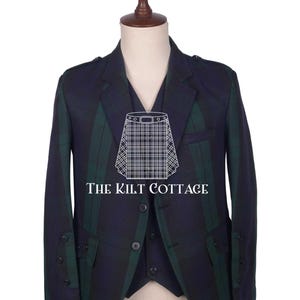 May include: A dark blue and green tartan jacket with a matching waistcoat. The jacket has a double-breasted fastening and features a pocket on each side. The text "The Kilt Cottage" is printed on the front of the jacket.