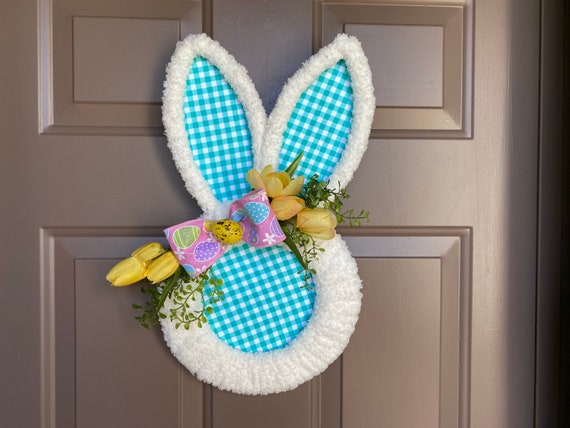 The Holiday Aisle® Easter Ribbon Wreath with Bunnies and Eggs