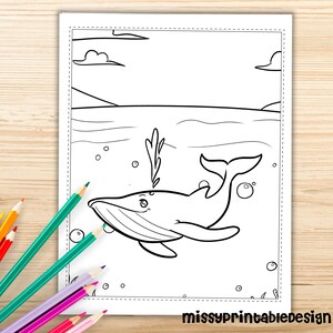 May include: A black and white line drawing of a whale swimming in the ocean. The whale has a friendly face and is surrounded by bubbles. The ocean is depicted with wavy lines and there are clouds in the sky above.