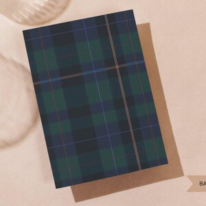 May include: A greeting card with a green, blue, and black plaid pattern. The card is on top of a brown envelope. The words "BACK DESIGN" are visible on the bottom right corner. The LuxeMe Customs logo is in the top right corner.
