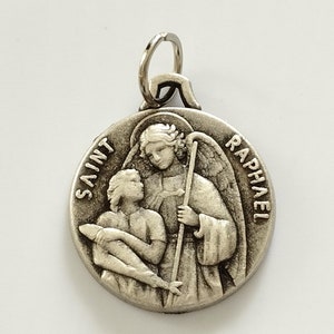 Beautiful vintage religious medal of Saint Raphael the Archangel in metal