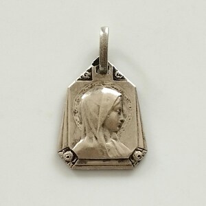 Old small silver medal of the Virgin of Lourdes grotto