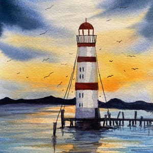 May include: A watercolour painting of a lighthouse on a pier with a sunset in the background. The lighthouse is white with red stripes and a red roof. There are birds flying in the sky.