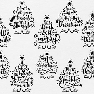 May include: Black and white Christmas tree illustrations with various holiday sayings. The sayings include "Don't get your tinsel in a tangle", "Eat, drink & be merry", "Have a holly jolly Christmas", "Have yourself a merry little Christmas", "Hot cocoa for Santa", "It takes a big heart to teach little minds", "My 1st Christmas", "Tis the season to sparkle", and "We wish you a merry Christmas".